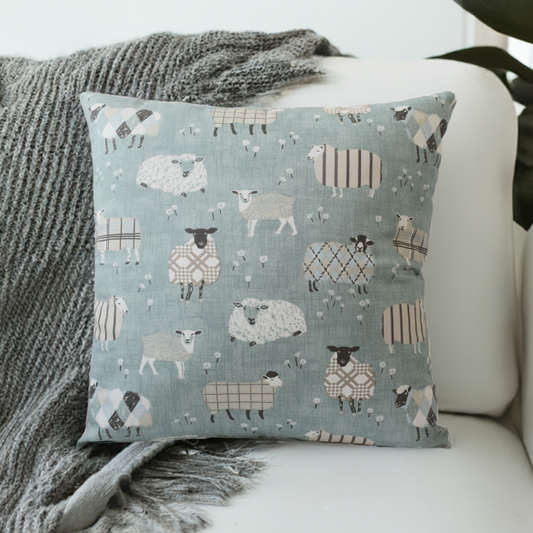 just cushions baa baa cute cushion with sheep duck egg blue sustainable 100% cotton cushion handmade in the uk